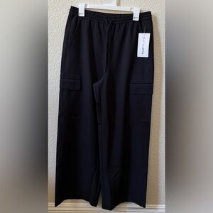 Athleta Small Promenade Cargo Pant Snap Pockets Wide Leg Black Pull On MSRP $129